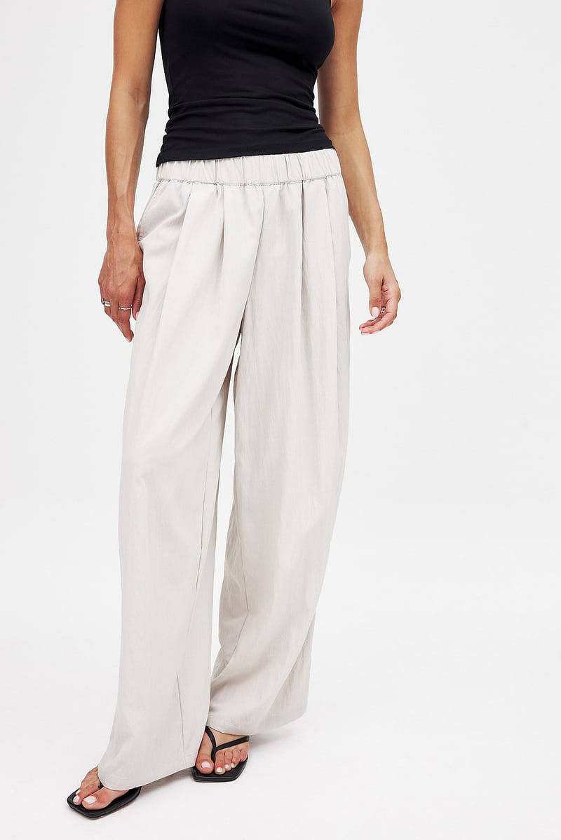 10307-crinkled-elastic-waist-wide-leg-trousers-light-beige-1.jpg