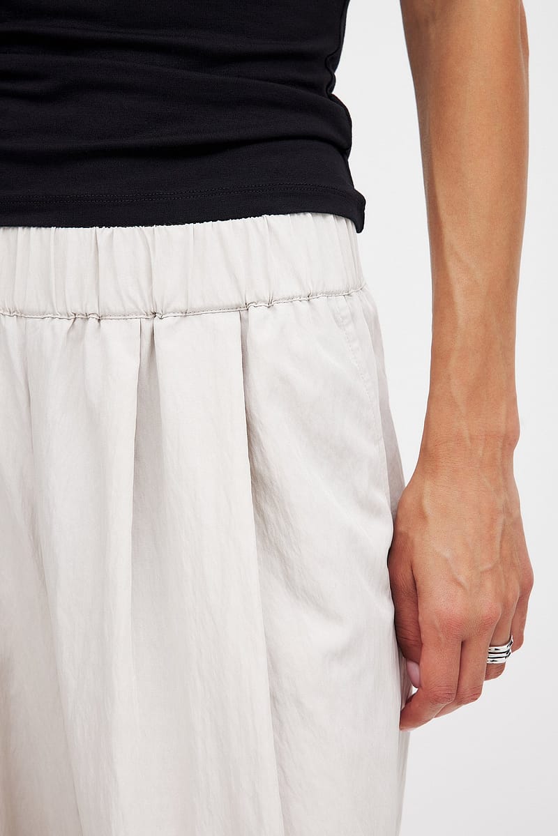 10307-crinkled-elastic-waist-wide-leg-trousers-light-beige-1.jpg