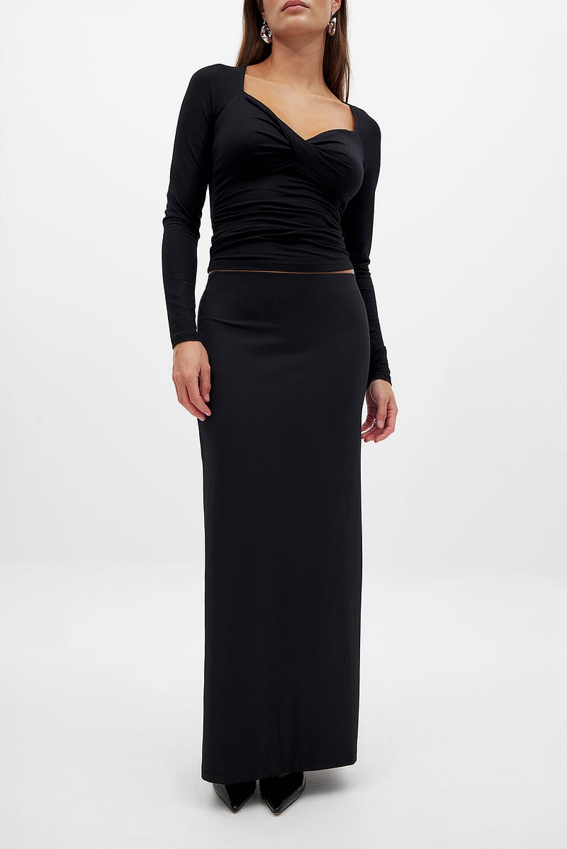 11908-body-hugging-low-waist-skirt-black-1.jpg