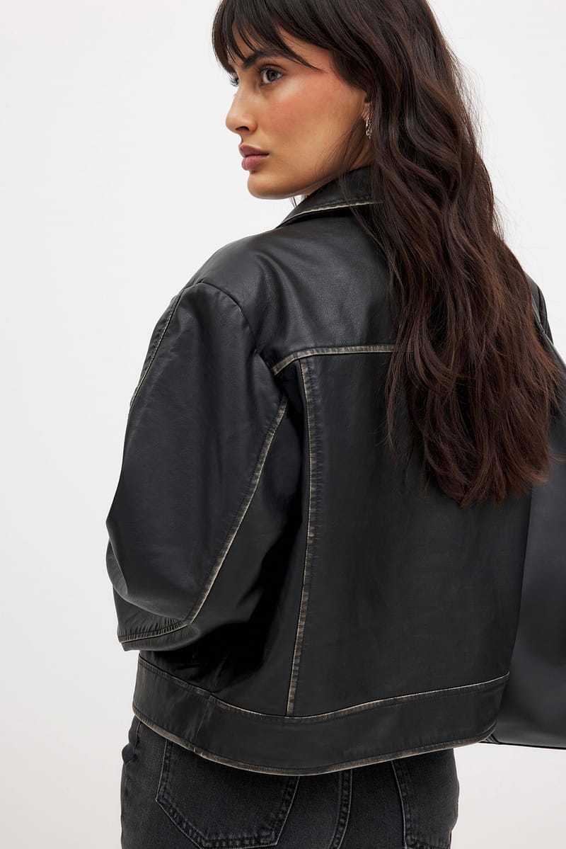 3104-washed-out-detailed-pu-jacket-black-1.jpg