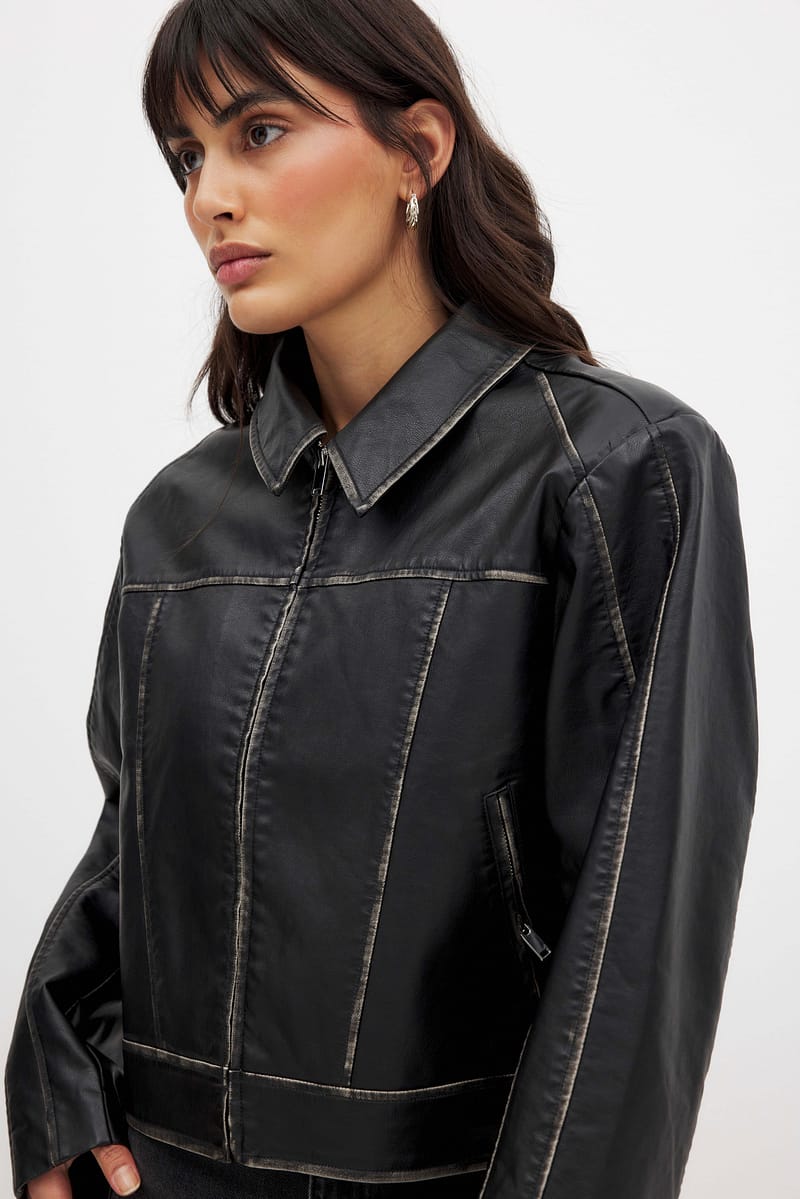 3104-washed-out-detailed-pu-jacket-black-1.jpg