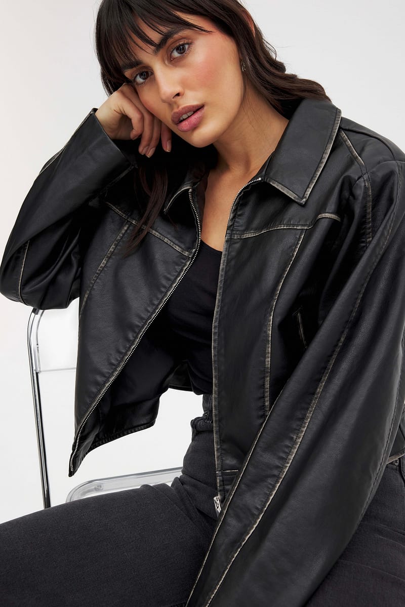 3104-washed-out-detailed-pu-jacket-black-1.jpg