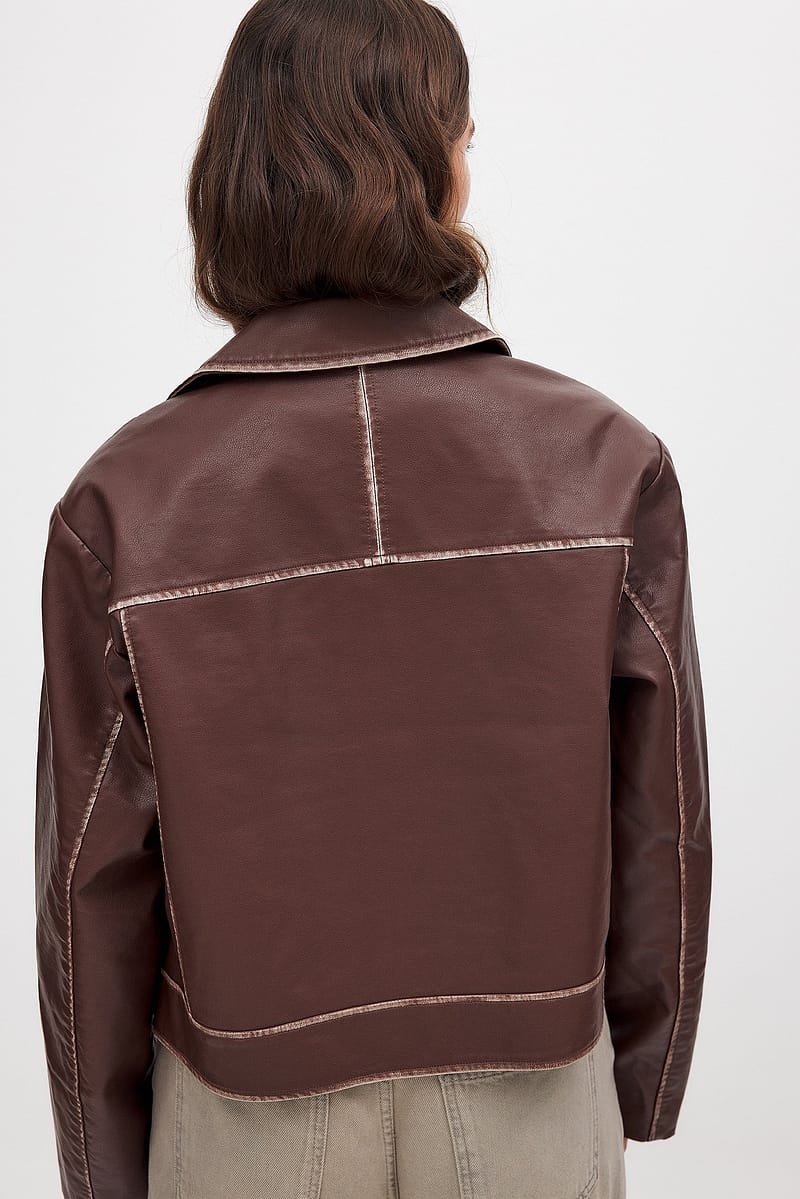 3109-washed-out-detailed-pu-jacket-1.jpg