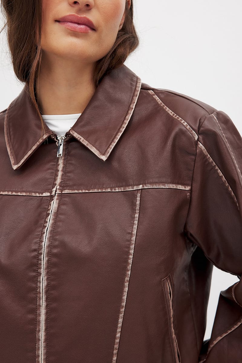 3109-washed-out-detailed-pu-jacket-1.jpg
