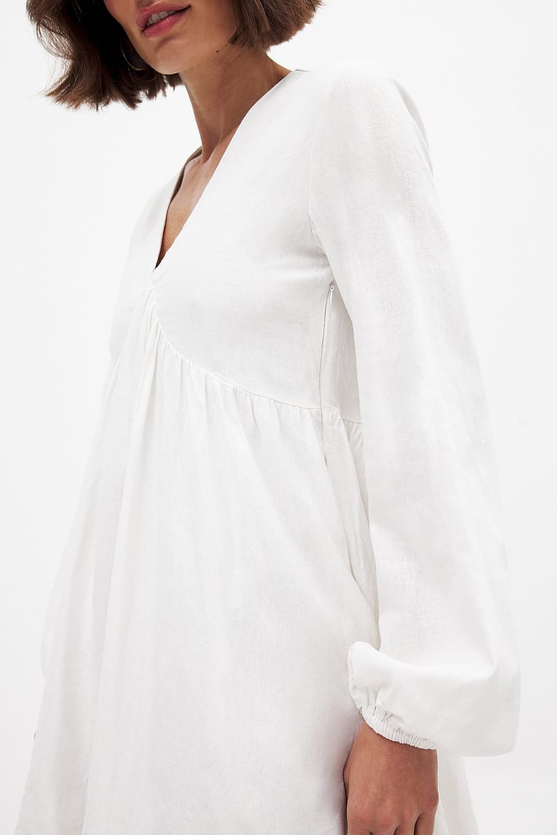 8253-linen-blend-ls-flowy-mini-dress-white-1.jpg